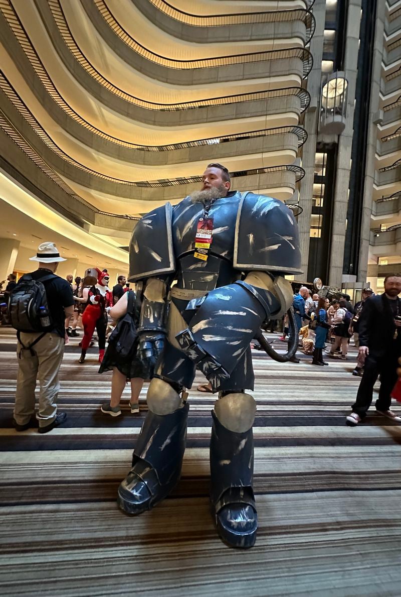 Andrew Heil, an Alabama mechanical engineer, spent three months building his space warrior costume from "Warhammer: 40,000," a tabletop wargame launched in the 1980s. RODNEY HO/rho@ajc.com