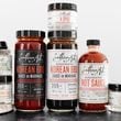 Southern Art Co. offers hot sauce, two Korean barbecue sauces and a line of seasonings. (Courtesy of Anna Killian)