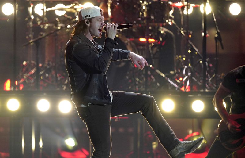 FILE - Morgan Wallen performs during the 56th annual CMA Awards in Nashville, Tenn., on Nov. 9, 2022. (AP Photo/Mark Humphrey, File)