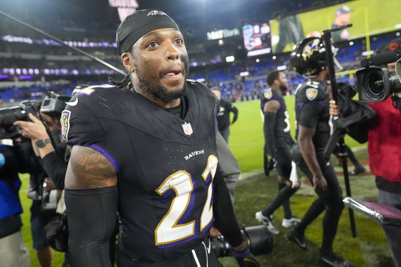 Baltimore Ravens running back Derrick Henry walk on the field following an NFL football game against the Buffalo Bills, Sunday, Sept. 29, 2024, in Baltimore. The Ravens won 35-10. (AP Photo/Stephanie Scarbrough)