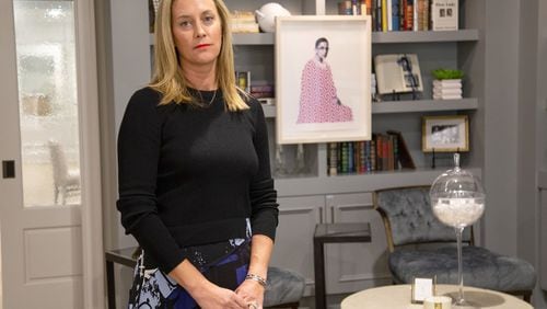  Eleanor's Place founder Jennifer Morgan stands in front of a Ruth Bader Ginsburg painting at her private, women-only co-working space in Atlanta Saturday, September 19, 2020.  STEVE SCHAEFER / SPECIAL TO THE AJC 