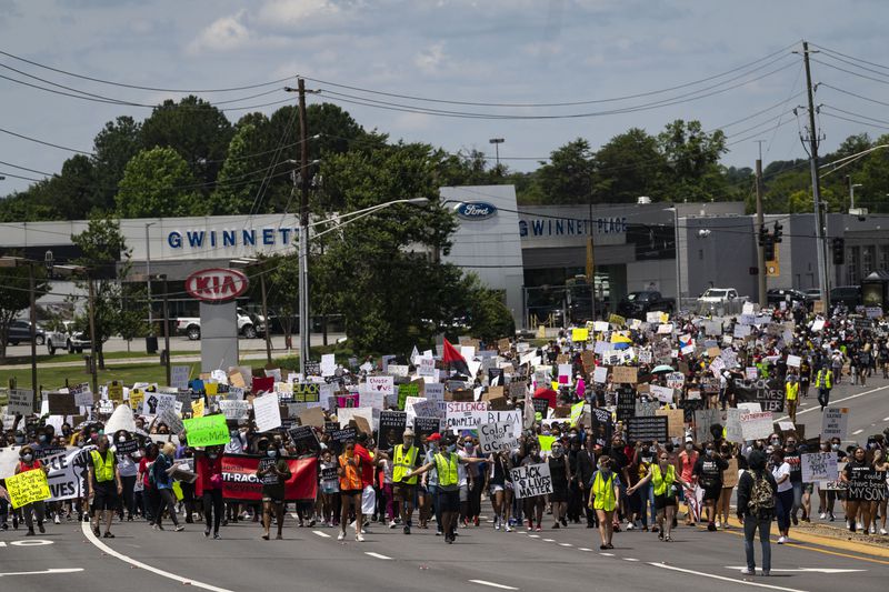 Demonstrators make their way down Satellite Boulevard during a protest billed as "Justice for Black Lives," which originated at Gwinnett Place mall on Sunday, June 7, 2020. (Photo: John Amis for The Atlanta Journal-Constitution)