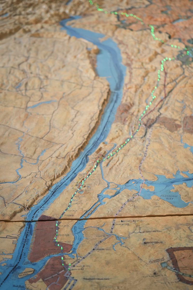 The island of Manhattan, center left, appears on a relief map that displays water supply systems to the city after a news conference about repairs occurring to the water supply infrastructure in New York, Monday, Sept. 30, 2024. (AP Photo/Seth Wenig)