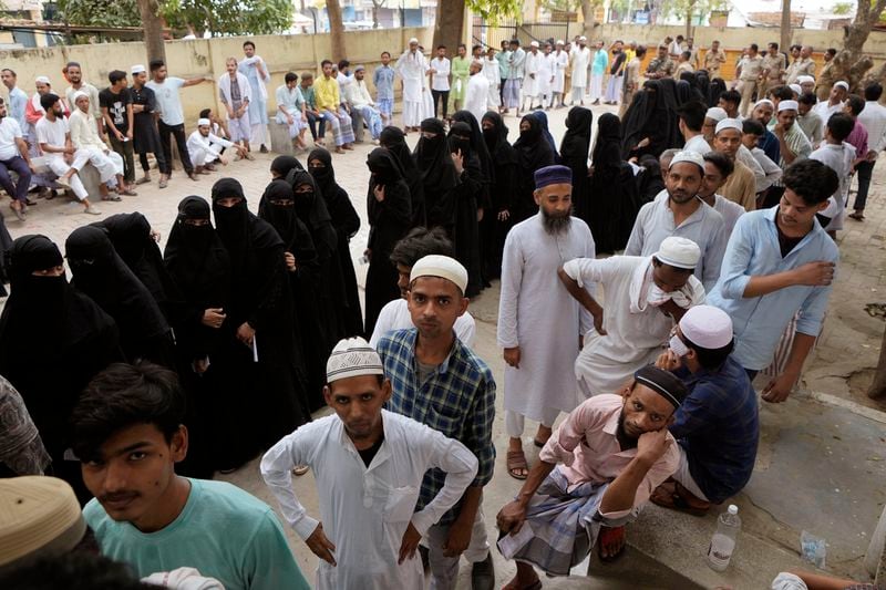 Muslims stand in queues to cast their votes in the seventh and final phase of national elections, in Varanasi, India, Saturday, June 1, 2024. Indians began voting Saturday in the last round of a six-week-long national election that is a referendum on Hindu nationalist Prime Minister Narendra Modi’s decade in power. (AP Photo/Rajesh Kumar Singh)
