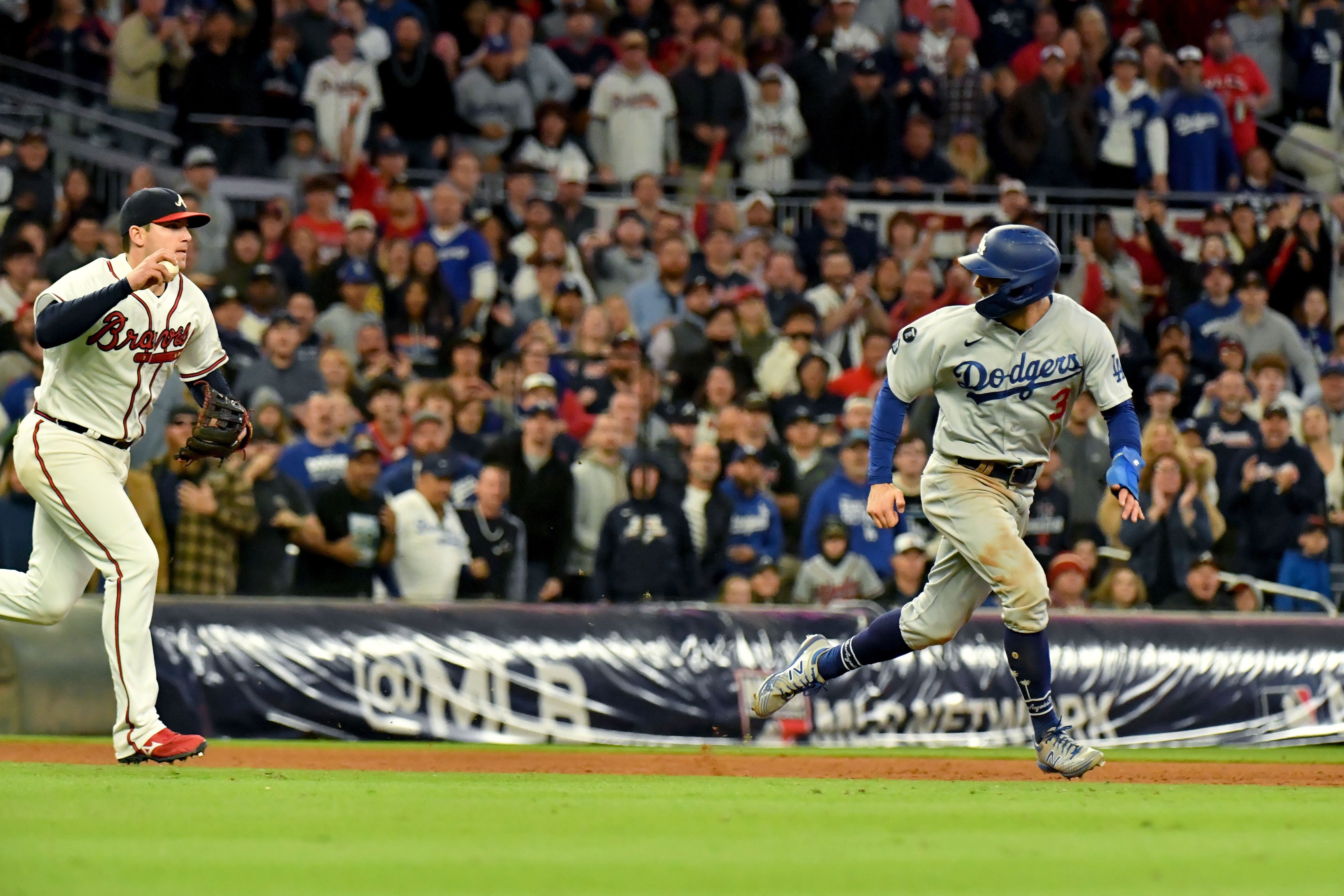 Download Chris Taylor Triumphantly Holds Up His Baseball Bat Wallpaper