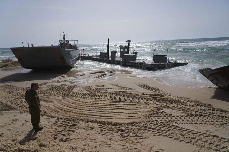 A U.S. Army landing craft is seen beached in Ashdod on Sunday, May 26, 2024, after being swept by wind and current from the temporary humanitarian pier in the Gaza Strip. (AP Photo/Tsafrir Abayov)