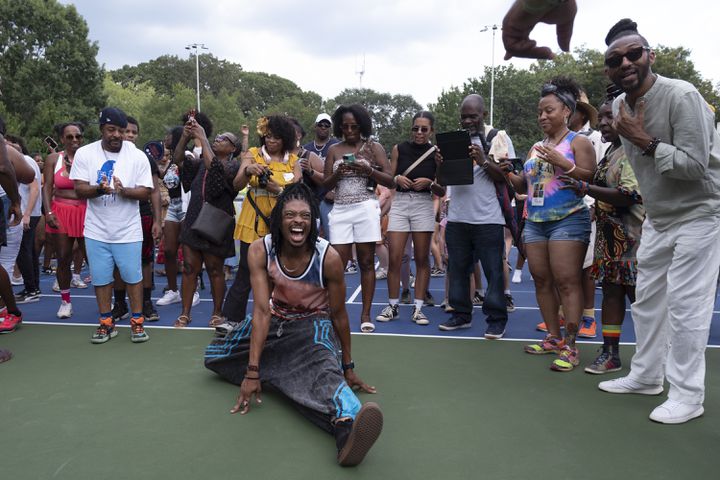 People dance on the tennis courts at Grant Park during the 20th anniversary of the House In The Park music festival in Atlanta on Sunday, Sept. 1, 2024. (Ben Gray / Ben@BenGray.com)