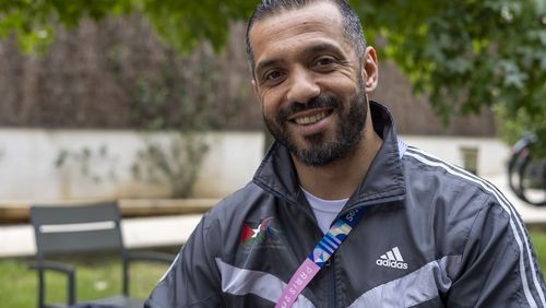 Palestinian athlete Fadi Aldeeb poses for a photograph outside the athletes' village at the Paralympic Games in Paris, Tuesday, Sept. 3, 2024. (AP Photo/Ciaran Fahey)