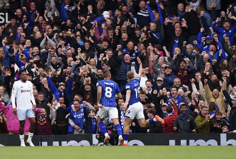 Ipswich Town's Liam Delap (right) celebrates scoring during the British Premier League soccer match between Ipswich Town and Aston Villa at Portman Road, Ipswich, England, Sunday Sept. 29, 2024. (Zac Goodwin/PA via AP)