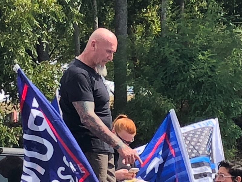 Rally organizer Chester Doles readies for the rally in downtown Dahlonega on Saturday, Sept. 14, 2019. (Photo: Chris Joyner/AJC)