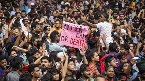 People participate in a protest march against Prime Minister Sheikh Hasina and her government to demand justice for the victims killed in the recent countrywide deadly clashes, in Dhaka, Bangladesh, Saturday, Aug. 3, 2024. (AP Photo/Rajib Dhar)