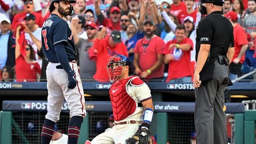 Braves shortstop Dansby Swanson strikes out during the sixth inning in Game 4 of the National League Division Series on Saturday at Citizens Bank Park in Philadelphia. (Hyosub Shin / Hyosub.Shin@ajc.com)