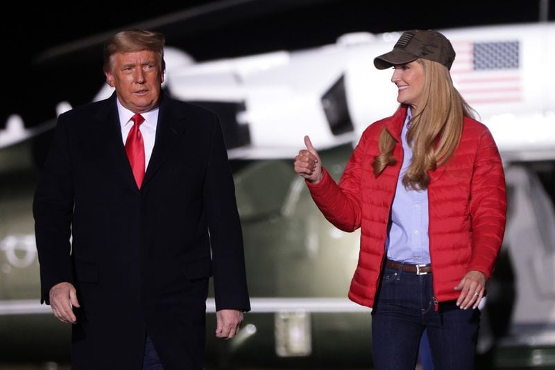 Former U.S. Sen. Kelly Loeffler, R-Ga., recently attended a get-out-the-vote program for Donald Trump. She is pictured with the former president in Dalton, Ga., in 2021.