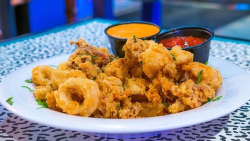 Fried calamari served with our red aioli sauce and "crazy sauce" is on the menu at Crazy Atlanta.