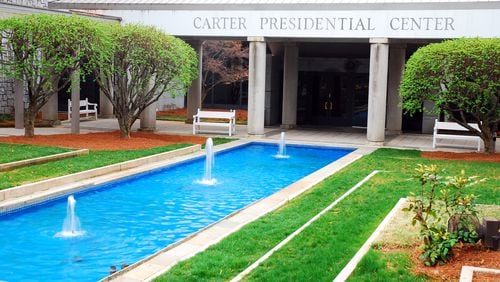 A reflective pool  in front of the Jimmy Carter Presidential Library and Museum in Atlanta. A number of events are planned to mark the former president's 100th birthday later this year. Some of the events are scheduled in Carter's hometown of Plains and in Atlanta, including at the presidential library. (James Kirkikis/Dreamstime/TNS)