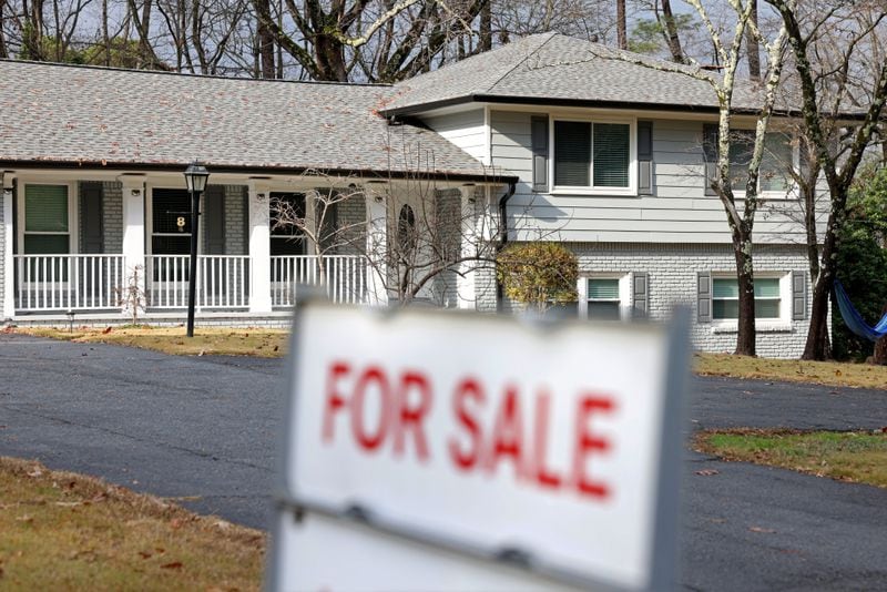 A single family style home is shown for sale, Wednesday, December 7, 2022, in Dunwoody, Ga. (Jason Getz / Jason.Getz@ajc.com)