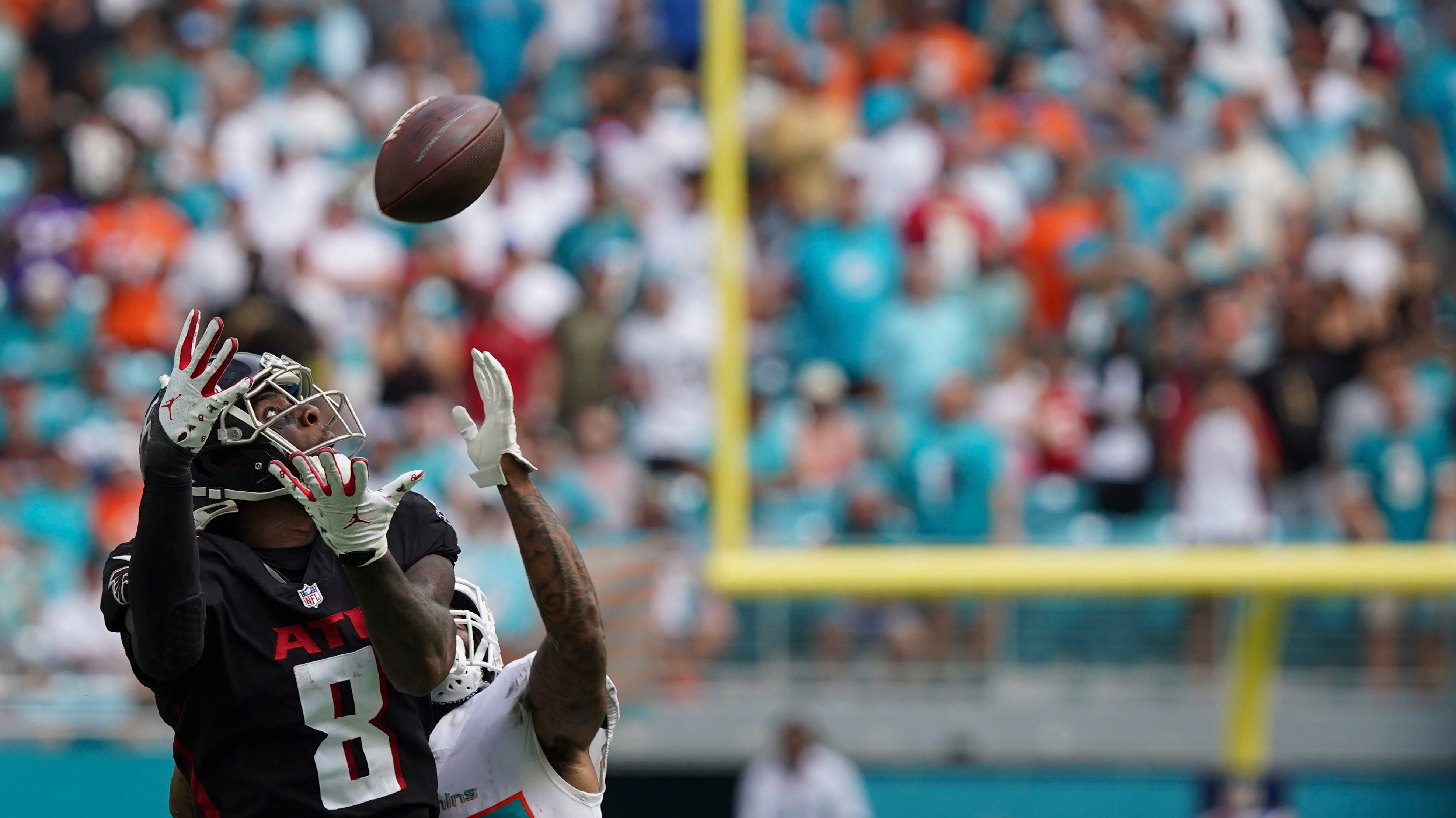 Atlanta Falcons defensive back T.J. Green (39) walks off the field after  the Miami Dolphins defeated the Atlanta Falcons during a preseason NFL  football game, Saturday, Aug. 21, 2021, in Miami Gardens