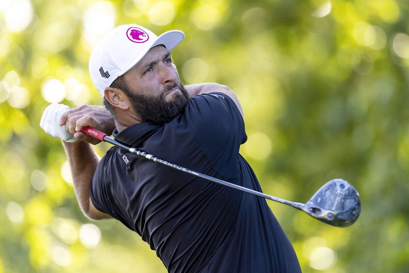 Captain Jon Rahm, of Legion XIII, hits from the 17th tee during the final round of LIV Golf Greenbrier at The Old White at The Greenbrier, Sunday, Aug. 18, 2024, in White Sulphur Springs, W.Va. (Chris Trotman/LIV Golf via AP) )