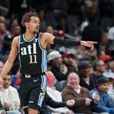 Atlanta Hawks guard Trae Young (11) reacts after making a basket during the first half against the Chicago Bulls at State Farm Arena, Monday, February 12, 2024, in Atlanta. (Jason Getz / jason.getz@ajc.com)