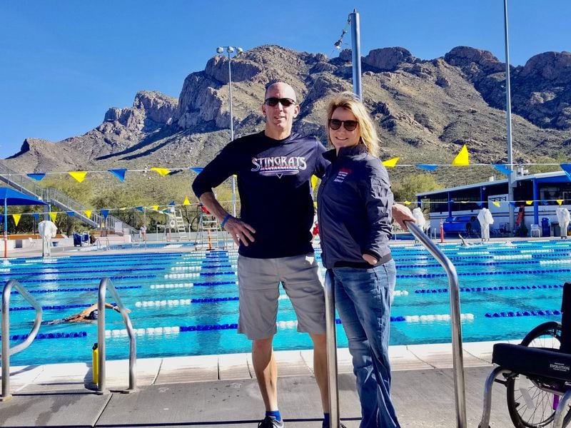 Aimee Copeland poses with coach Keith Berryhill before the Paralympic National Swimming Championships last month in Tucson, Ariz. They met when Copeland started swimming at the Windy Hill Athletic Club. CONTRIBUTED