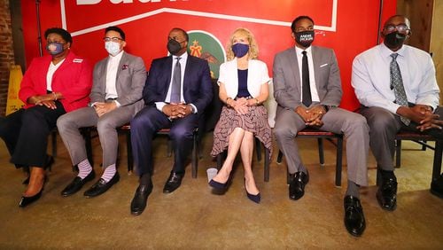 080421 Atlanta: Mayoral candidates Council President Felicia Moore (from left), Councilman Antonio Brown, former Atlanta Mayor Kasim Reed, attorney Sharon Gay, Councilman Andre Dickens, and local businessman Richard Wright take part in a mayoral debate hosted by The Young Democrats of Atlanta at Manuel’s Tavern on Wednesday, August 4, 2021, in Atlanta.   “Curtis Compton / Curtis.Compton@ajc.com”