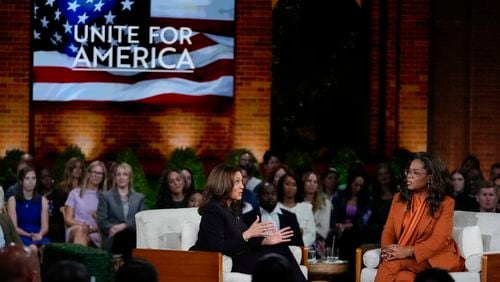 Democratic presidential nominee Vice President Kamala Harris joins Oprah Winfrey at Oprah's Unite for America Live Streaming event Thursday, Sept. 19, 2024 in Farmington Hills, Mich. (AP Photo/Paul Sancya)