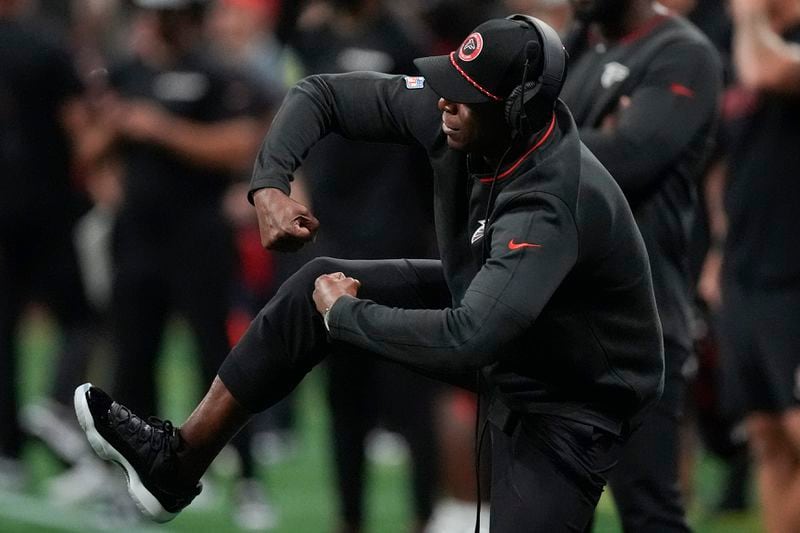 Atlanta Falcons head coach Raheem Morris watches play against the Jacksonville Jaguars in the first half of an NFL preseason footballl game, Friday, Aug. 23, 2024, in Atlanta. (AP Photo/John Bazemore)