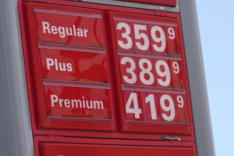 Gasoline prices are displayed on a sign outside a service station as the Memorial Day holiday travel period kicks off Thursday, May 23, 2024, in Greenwood Village, Colo. (AP Photo/David Zalubowski)