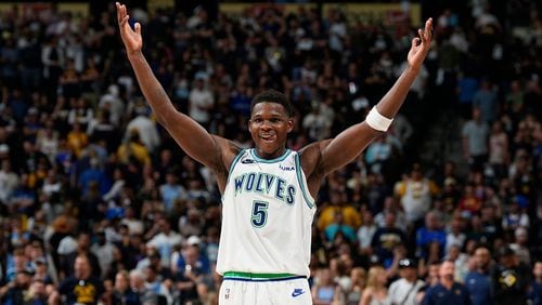 Minnesota Timberwolves guard Anthony Edwards gestures as time runs out in the second half of Game 7 of an NBA second-round playoff series against the Denver Nuggets, Sunday, May 19, 2024, in Denver. (AP Photo/David Zalubowski)
