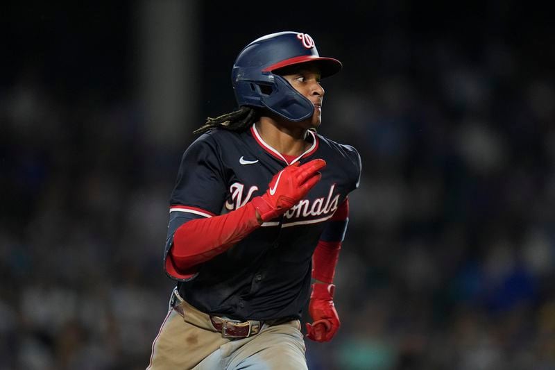 Washington Nationals' CJ Abrams runs the bases on a double during the third inning of a baseball game against the Chicago Cubs, Thursday, Sept. 19, 2024, in Chicago. (AP Photo/Erin Hooley)