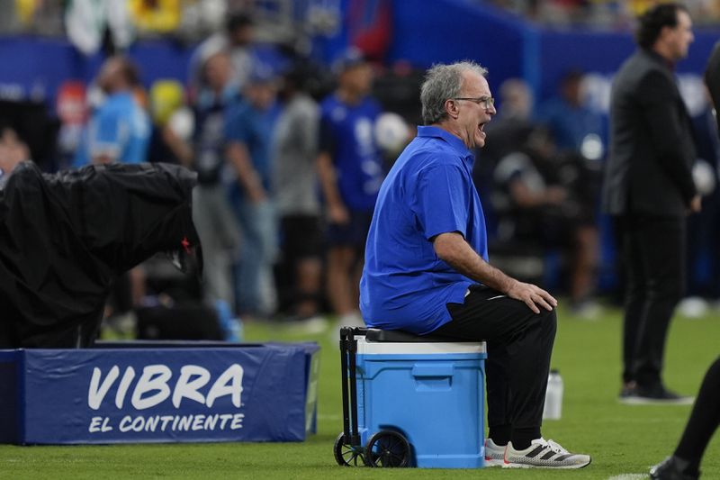 Uruguay's coach Marcelo Bielsa reacts during a Copa America semifinal soccer match against Colombia in Charlotte, N.C., Wednesday, July 10, 2024. (AP Photo/Julia Nikhinson)