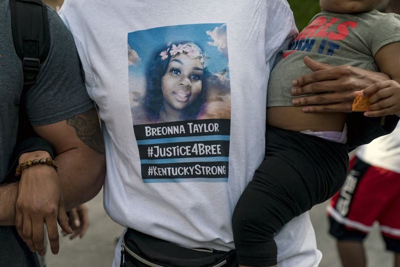 Protesters rally in Louisville, Ky., on Saturday, May 30, 2020. Protests in Louisville have centered on the death of Breonna Taylor, a black woman who was shot dead by white police officers who entered her home in March. 