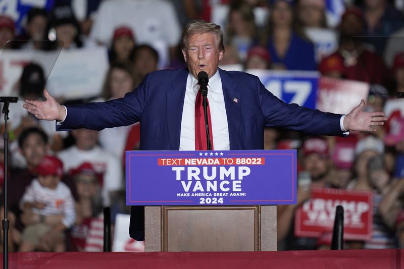 Republican presidential nominee former President Donald Trump speaks during a campaign event at the World Market Center, Friday, Sept.13, 2024, in Las Vegas. (AP Photo/John Locher)