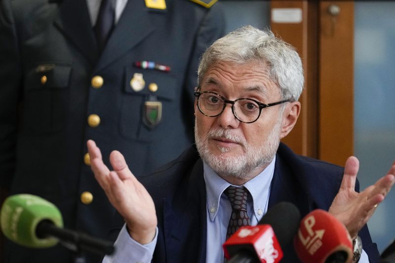 National Anti-Mafia Prosecutor Giovanni Milillo gestures as he speaks during a news conference at the Milan's court, in Milan, Italy, Monday, Sept. 30, 2024. (AP Photo/Luca Bruno)