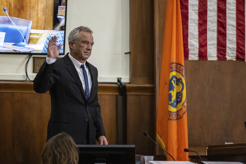 Independent Presidential candidate Robert F. Kennedy Jr. is sworn in prior to giving testimony at the Nassau County Supreme Court in Mineola, N.Y. on Wednesday, Aug., 21, 2024. (Stefan Jeremiah/Pool Photo via AP)