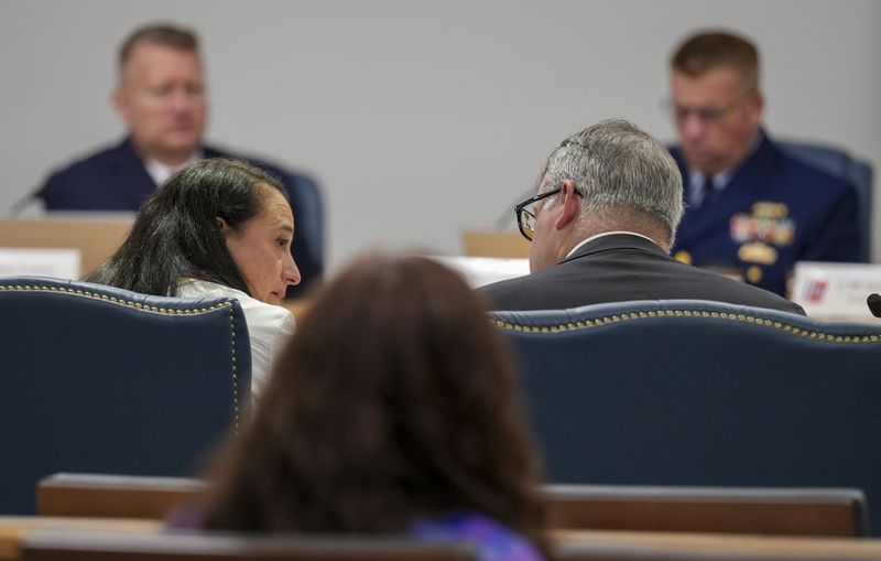 Renata Rojas, OceanGate mission specialist, center left, talks with her legal counsel, center right, during the Titan marine board formal hearing inside the Charleston County Council Chambers, Thursday, Sept. 19, 2024, in North Charleston, S.C. (Corey Connor via AP, Pool)