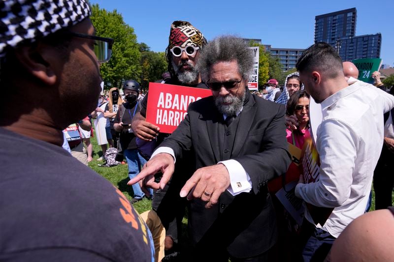 Progressive activist Cornel West gestures during a demonstration prior to a march to the Democratic National Convention Monday, Aug. 19, 2024, in Chicago. (AP Photo/Alex Brandon)