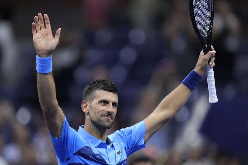 Novak Djokovic, of Serbia, reacts after defeating Radu Albot, of Moldova, during a first round match of the U.S. Open tennis championships, Monday, Aug. 26, 2024, in New York. (AP Photo/Matt Rourke)