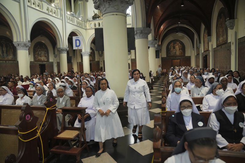 Nuns arrive for a meeting with Pope Francis in the Cathedral of Our Lady of the Assumption, the capital's main Catholic cathedral, in Jakarta, Indonesia, Wednesday, Sept. 4, 2024. (AP Photo/Dita Alangkara)