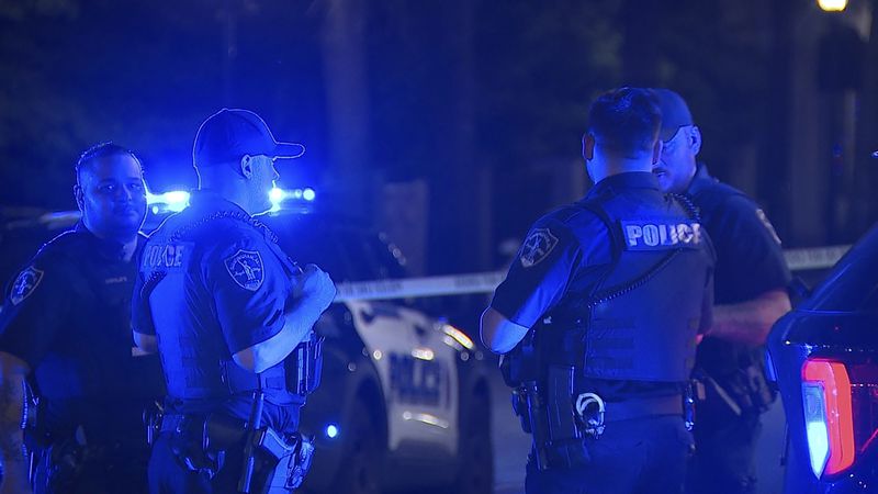 This image provided by WBMA shows police working on the scene of a shooting in Birmingham, Ala., Sunday, Sept. 22, 2024. (Bill Castle/WBMA via AP)