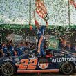 NASCAR Cup Series driver Joey Logano celebrates after winning the Quaker State 400 at Atlanta Motor Speedway, Sunday, Sept. 8, 2024, in Hampton. (Hyosub Shin / AJC)