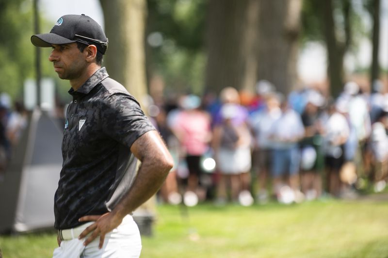 Aaron Rai waits during in the third round of the PGA Rocket Mortgage Classic golf tournament, Saturday, June 29, 2024, at the Detroit Golf Club in Detroit. (Katy Kildee/Detroit News via AP)