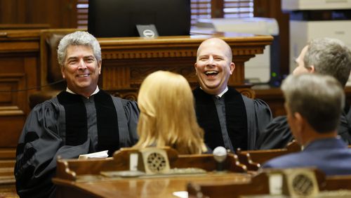 The new Georgia Chief Justice, Michael P. Boggs (left), and new Presiding Justice Nels S.D. Peterson smiles during the sworn-in ceremony at the State Capitol on Monday, July 18, 2022. Miguel Martinez /miguelmartinezjimenezajc.com
