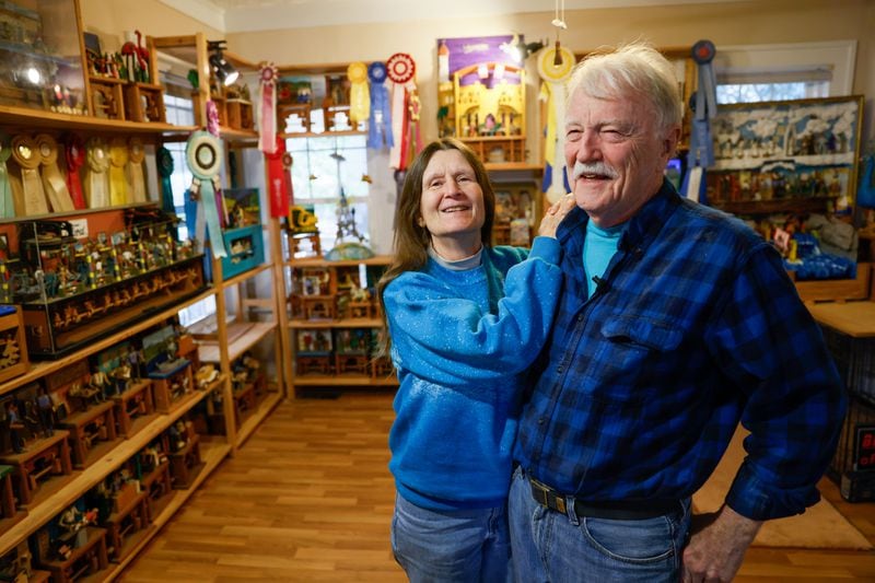 Woody Jones and his wife, Joan Thompson, show off Jones' showroom full of prototypes of the mechanical toys he has produced over the years. (Miguel Martinez /miguel.martinezjimenez@ajc.com)