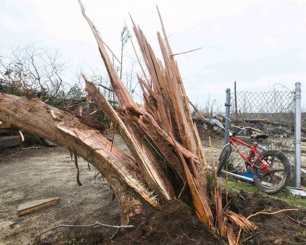 Photos: Tornadoes leave path of death, destruction in parts of Southeast