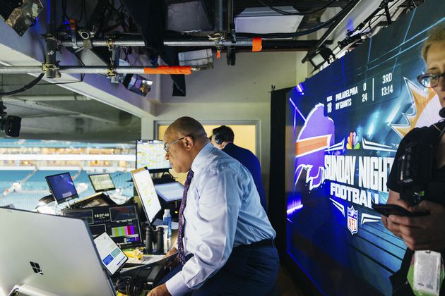 Sports commentator Mike Tirico rehearses in the broadcast booth during the Miami Dolphins vs. Buffalo Bills NFL game at Hard Rock Stadium in Miami Gardens, Fla. on Jan. 7, 2024. Alfonso Duran/The New York Times)