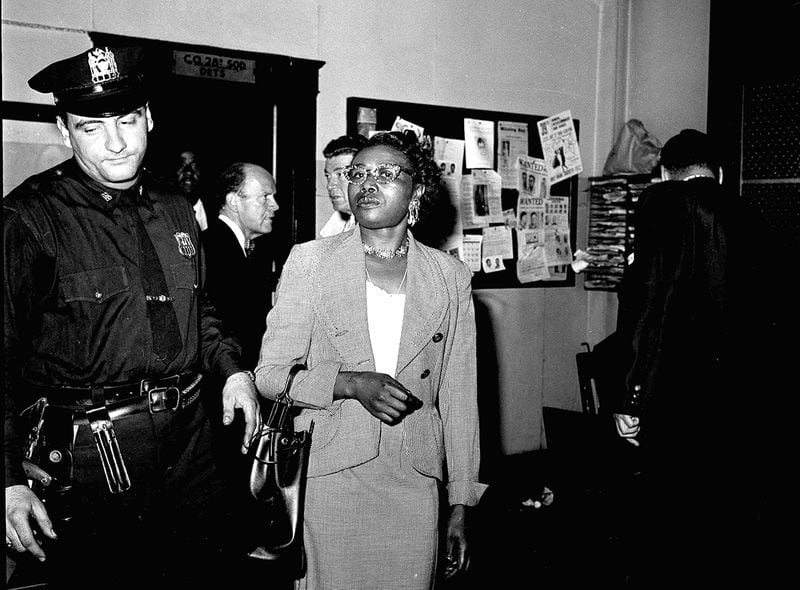 Izola Ware Curry enters a New York City police station, Sept. 20, 1958, where she was questioned in the stabbing of the Rev. Dr. Martin Luther King Jr. in a department store in Harlem during a book signing. Police said the civil rights leader was stabbed by Mrs. Curry, who told them several "rambling" stories and at times was incoherent. (AP Photo/Marty Lederhandler)