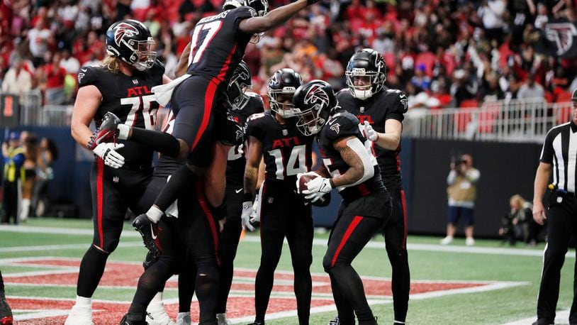 Atlanta Falcons players celebrate a touchdown by Atlanta Falcons