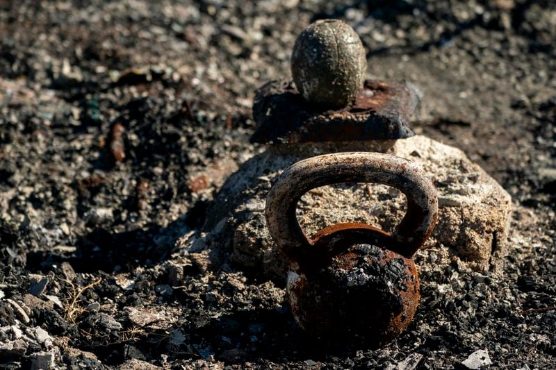 FILE - A burnt kettlebell sits in the debris of a home, Dec. 8, 2023, in Lahaina, Hawaii. (AP Photo/Lindsey Wasson, File)