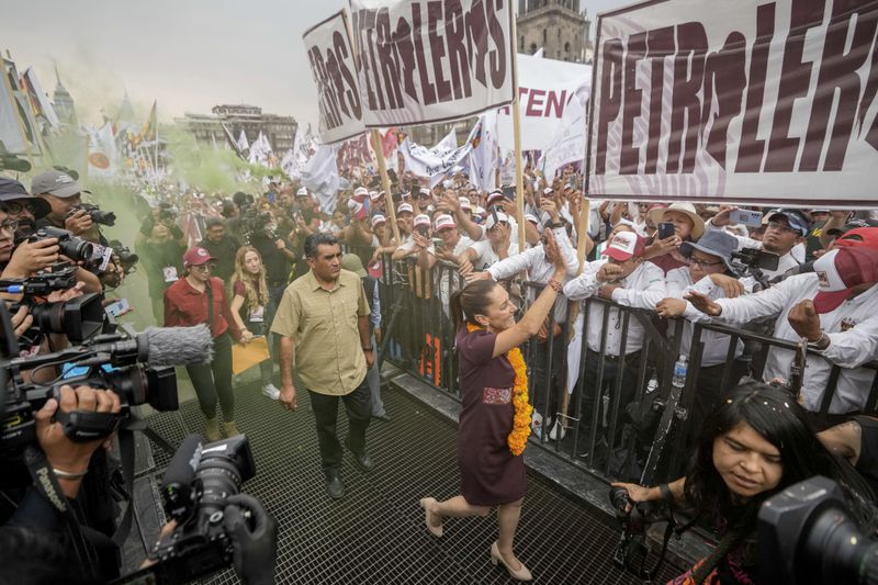 FILE - Presidential candidate Claudia Sheinbaum arrives at her closing campaign rally at the Zocalo in Mexico City, May 29, 2024. Sheinbaum, a climate scientist and former Mexico City mayor, will be sworn in as Mexico’s first woman president on Oct. 1. (AP Photo/Eduardo Verdugo, File)